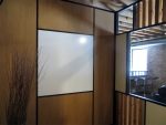 Integrated whiteboard wall with black wall trim and glazing bead #0270