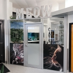 Demountable freestanding glass wall enclosed lobby