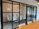 Glass demountable wall conference room black frame finish segmented #1633