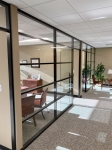 Glass office fronts with black frame transoms #1639