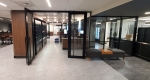 Glass store front with Locking Double Aluminum framed doors NxtWall Flex Series #1644