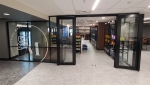 glass store front demountable walls with black frame finish - Flex Series NxtWall