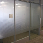 Sliding frameless glass door with matching privacy film #0664