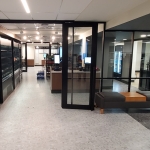 Glass store front with Locking Double Aluminum framed doors NxtWall Flex Series #1644