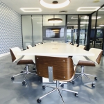 Conference room glass dividing wall with laminate decor panel and wall mount monitor #1619