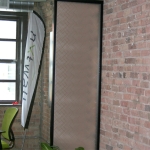 Decorative custom applied film on glass panel #0542