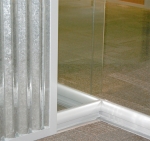 Glass office wing back wall intersection at the Chicago NxtWall showroom #0551