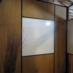 Integrated whiteboard wall with black wall trim and glazing bead #0270