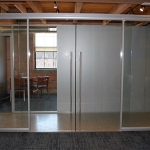 Double frameless glass sliding doors - conference room #0957
