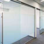 Glass office walls with soft-closing sliding glass door hardware #0632
