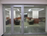 Reversible aluminum framed glass office door #0299