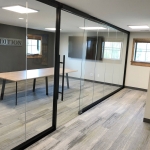 All glass conference room with black wall frame finish #1647