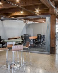 Glass Conference Room with 3form Ecoresin Wall Panels