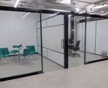 View glass office fronts with glass sliding doors and Flex series integrated whiteboard sidewalls View glass office fronts with glass sliding doors and Flex series integrated whiteboard sidewalls