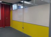 Classroom dividing wall partition with built in whiteboard and glass clerestory Classroom dividing wall partition with built in whiteboard and glass clerestory