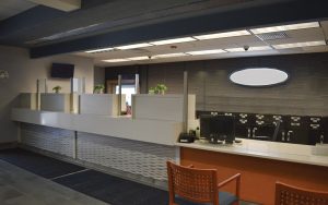 Bank teller protective glass screen by NxtWall