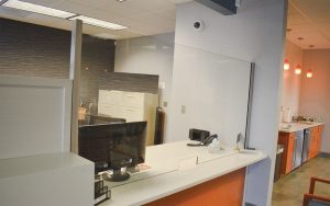 NxtWall glass shield with clear anodized finish