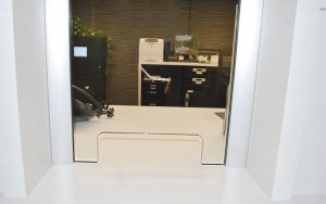 NxtWall glass screen protects employees and customers during face-to-face transactions