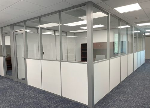 Half glass half solid wall offices with dividing wall glass clerestory