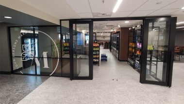Glass store front demountable walls with black frame finish - Flex Series NxtWall #1642