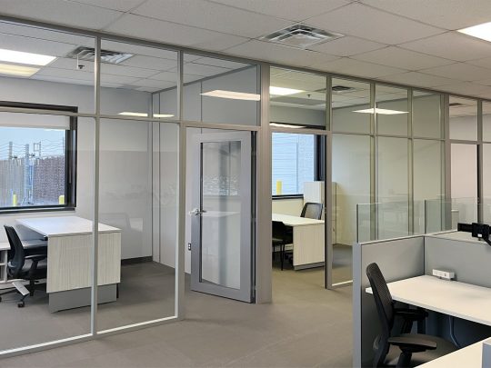 NxtWall Flex Series glass offices with powered solid panel sidewalls NxtWall Flex Series glass offices with powered solid panel sidewalls