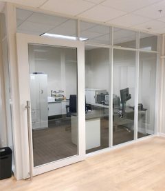 Flex Series Glass Office with Locking Bar Pull Door Hardware and Milk White Frame Finish Flex Series Glass Office with Locking Bar Pull Door Hardware and Milk White Frame Finish