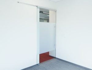 Frameless glass sliding door with soft open/close mechanism Frameless glass sliding door with soft open/close mechanism